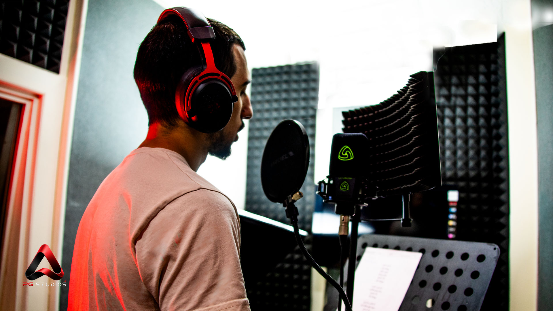 Voice recording with headphones and a studio microphone
