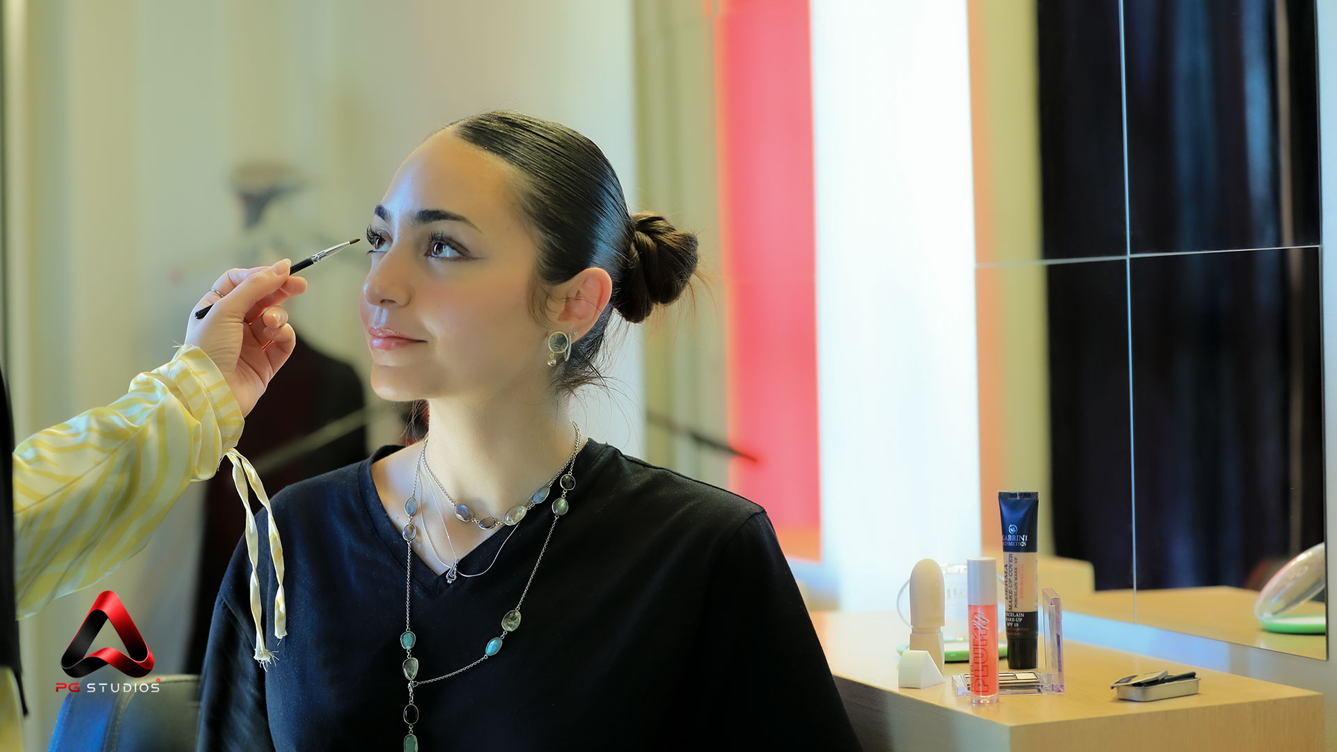Makeup preparation before a PG Studios production