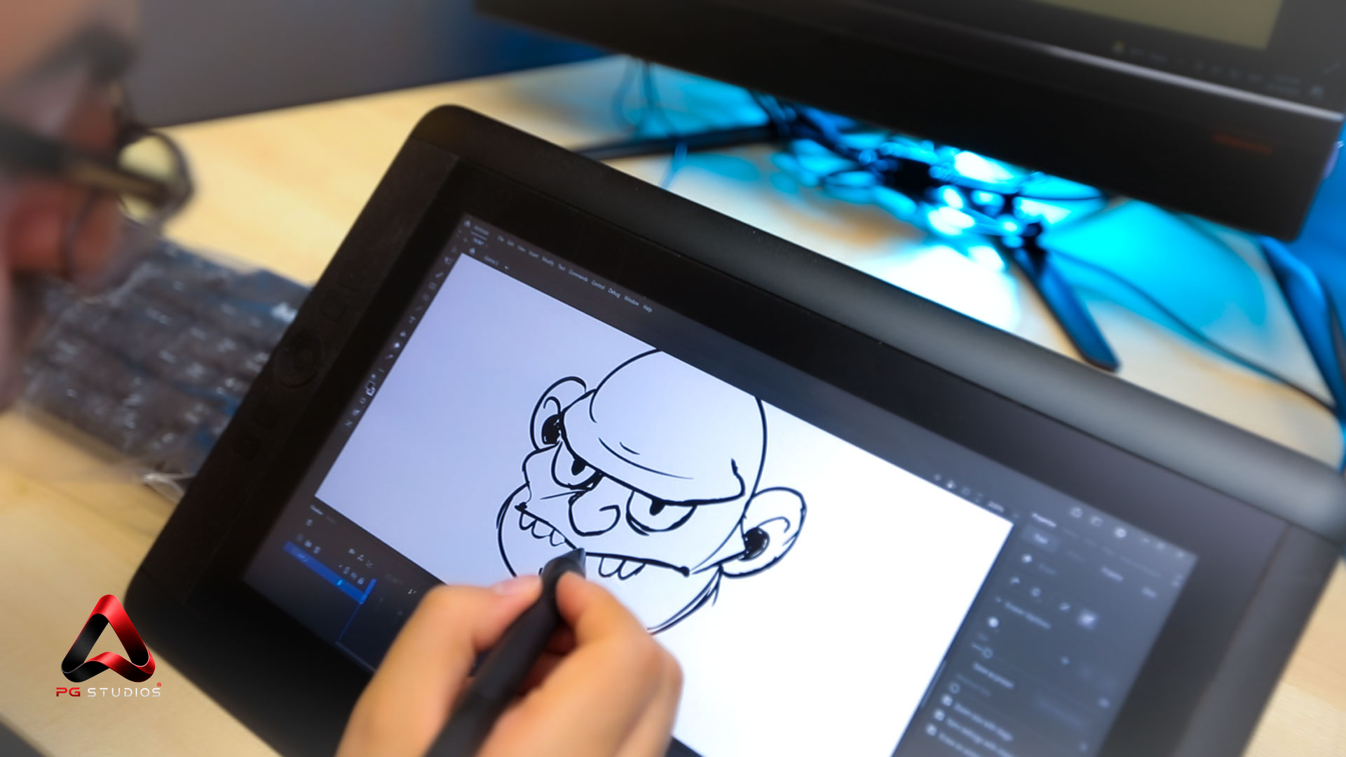 Character drawing on a pen display at PG Studios